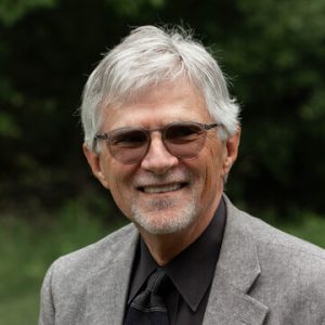 Dr. Michael Bar­rett